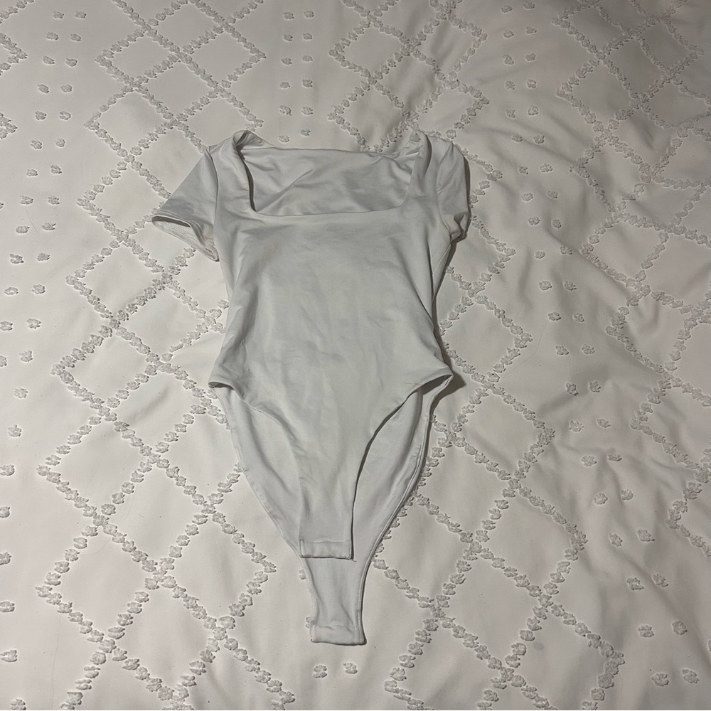 white bodysuit